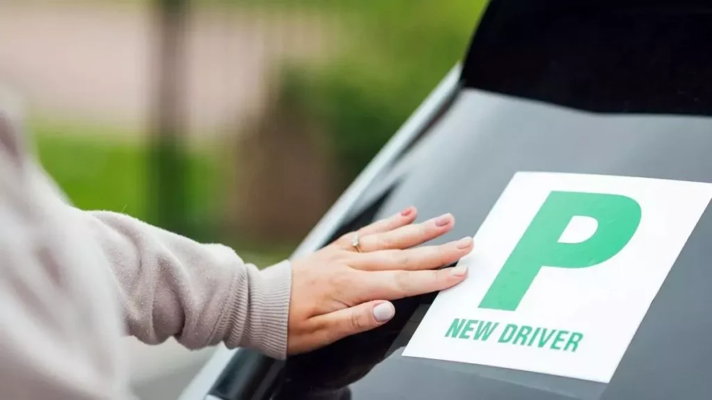 New driver displaying a probationary plate on their car in Singapore.