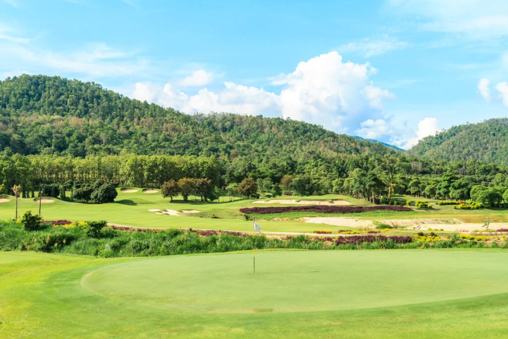 Panoramic view of the lush green golf course at The Els Club Desaru Coast