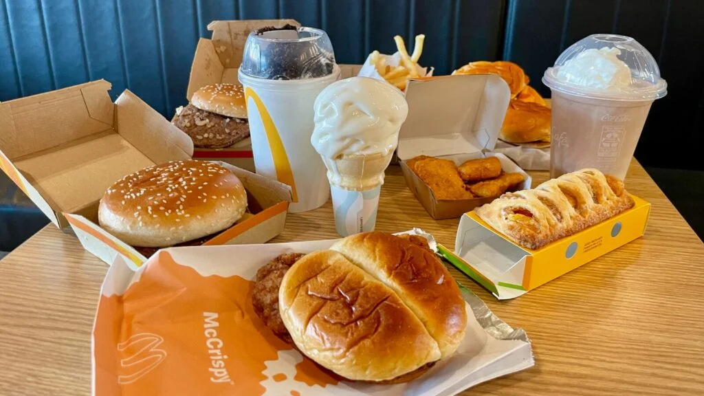 McDonald's menu items, including burgers, fries, salads, and wraps.